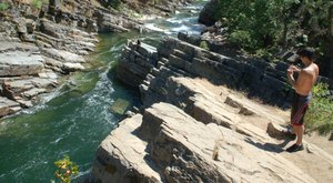 Enjoy Crystal-Clear Water At Yaak River Falls, A Gorgeous Swimming Hole Tucked Away In Montana