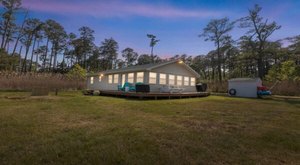 Explore The Coast Of Scotland, Maryland At This Cabin With A Private Dock And A Haunted Lighthouse